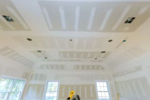 Comparison of smooth and textured drywall finishes in an Edmonton residential interior